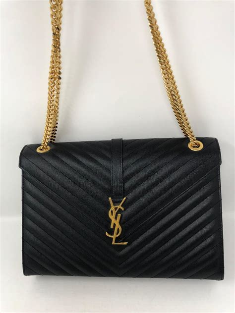 ysl black and gold clutch|authentic ysl handbag clutch.